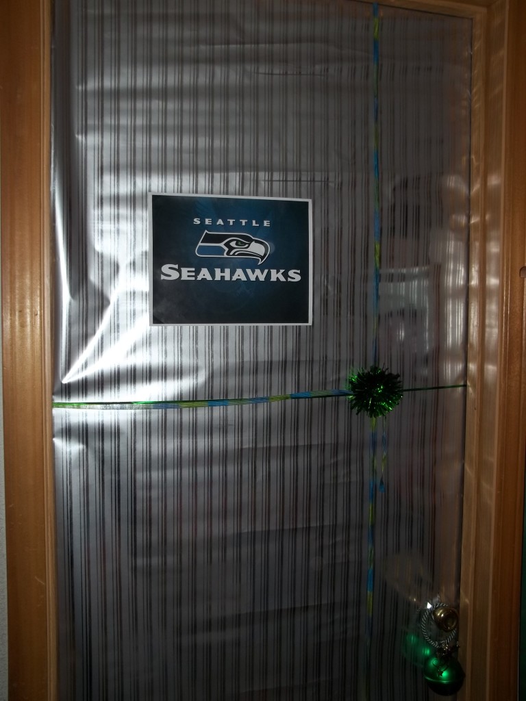 This door is done up by our lover of green and of course, Seahawks!